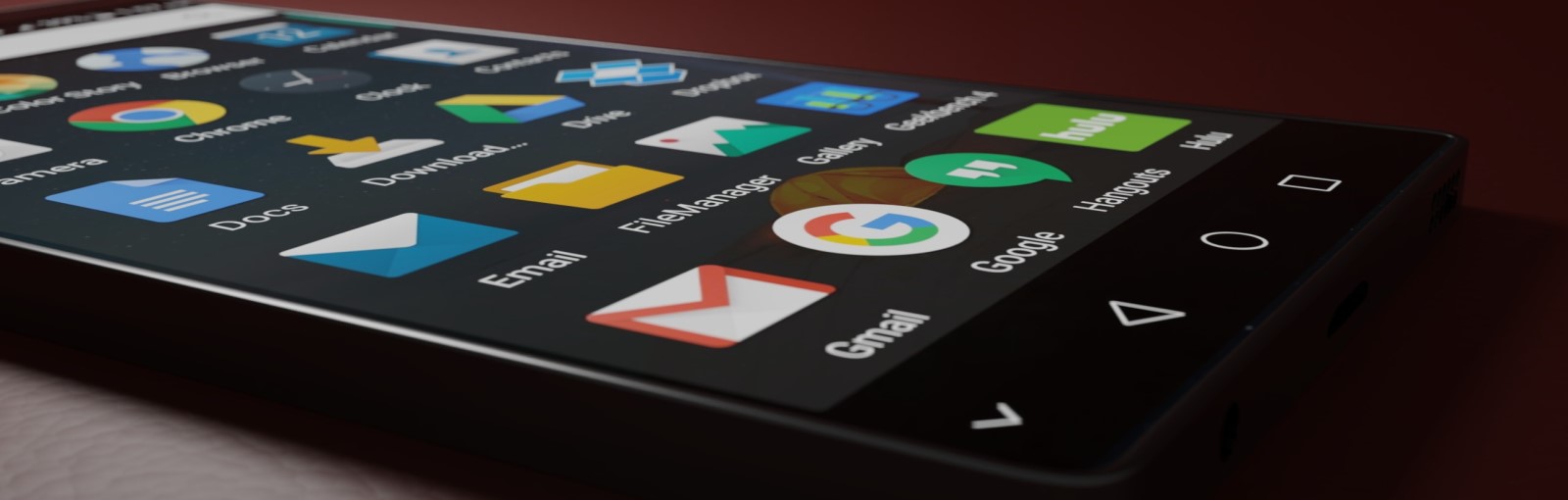 Close-up of a smartphone screen showing various app icons including Email, Gmail, FileManager, Google, and others on a red background.