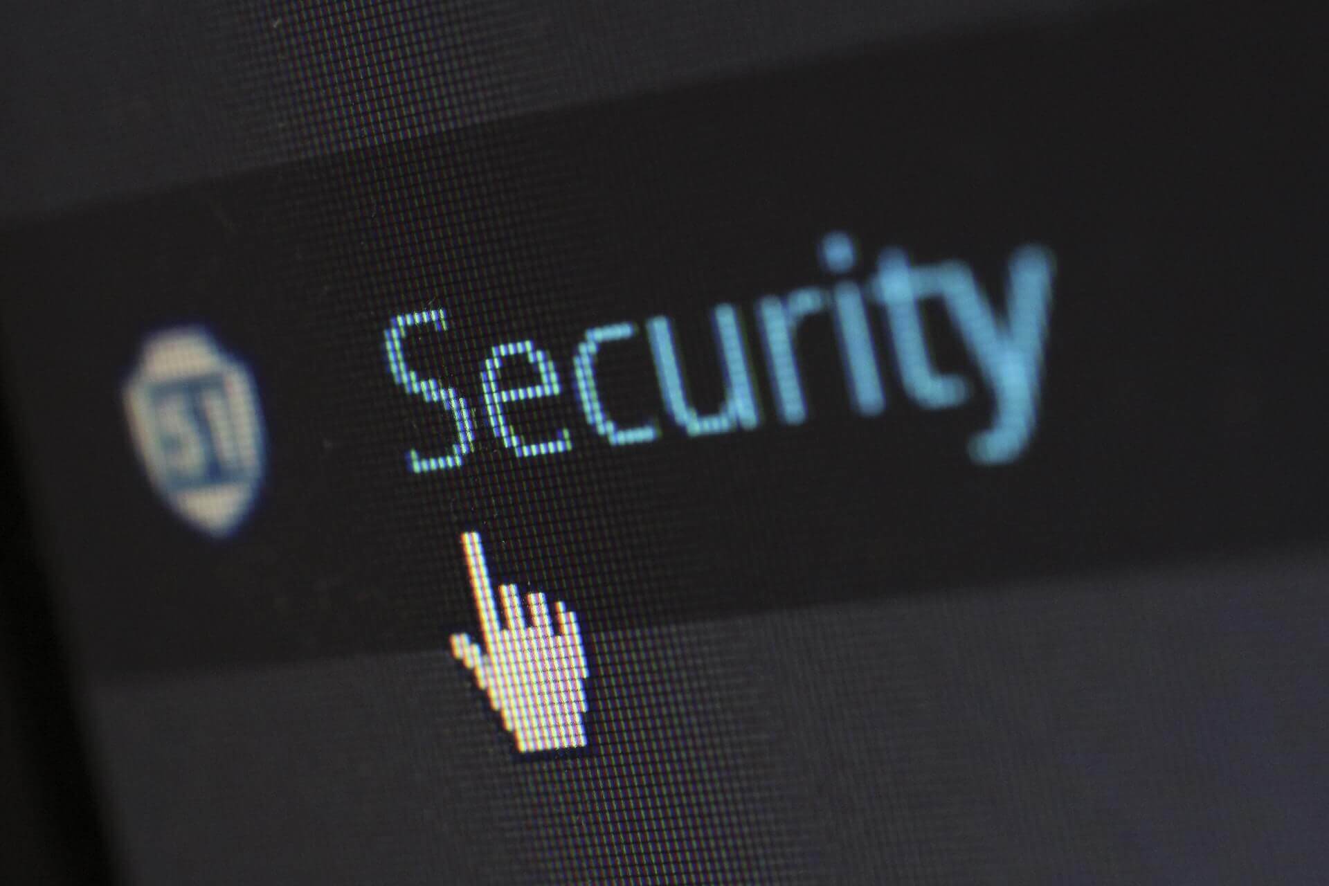 Cursor pointing at the word "Security" on a computer screen.