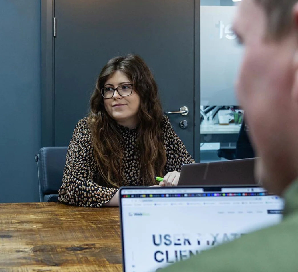 Employee smiling in meeting