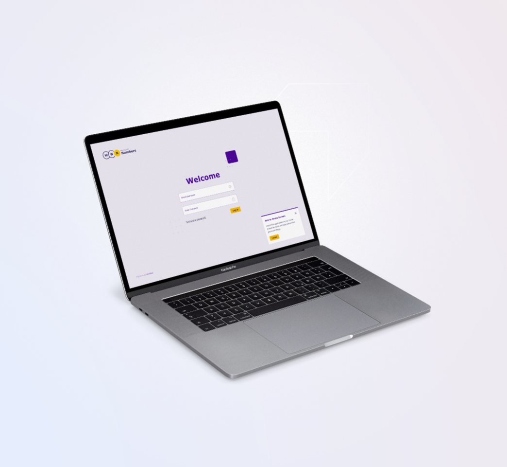 A laptop displaying a login screen with fields for email and password, and buttons for "Sign In" and "Forgot Password?".